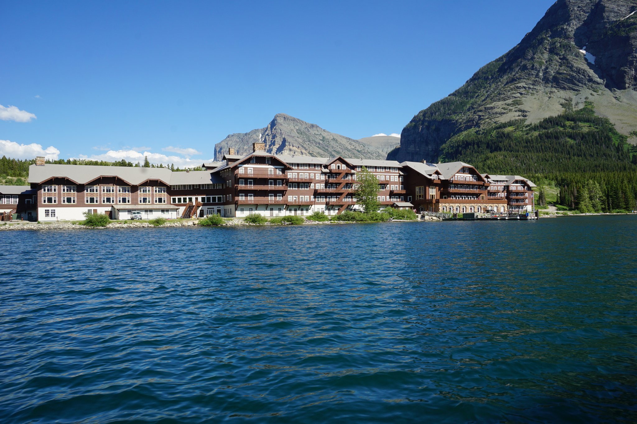 Leaving behind Many Glacier Hotel on Boat Tour