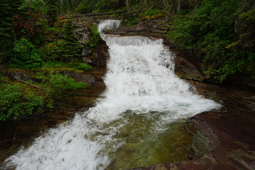 Waterfall along St Mary Falls trail