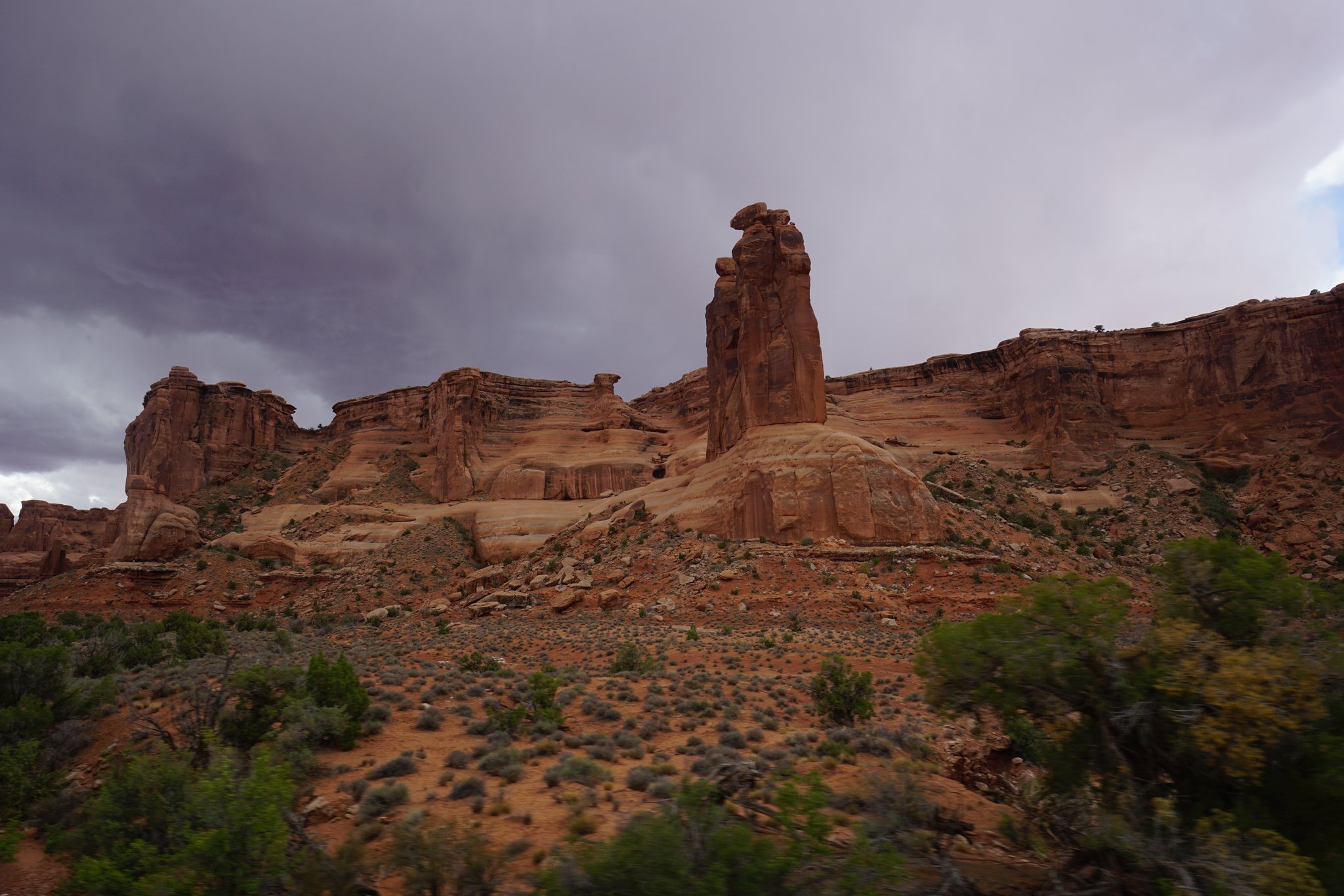 Leaving Arches Under Darkening Skies