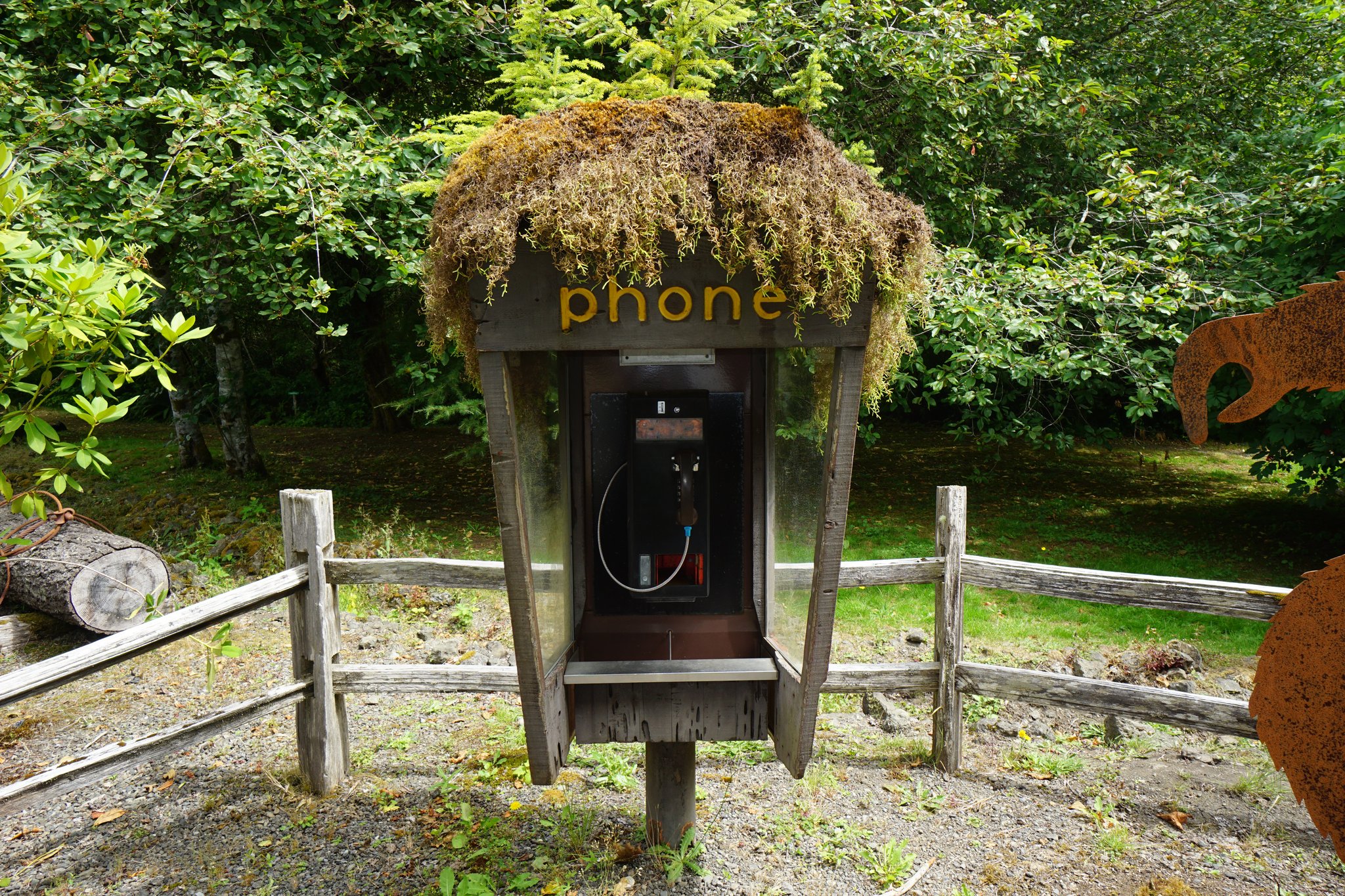 Moss Covered Telephone Booth Outside Timber Museum